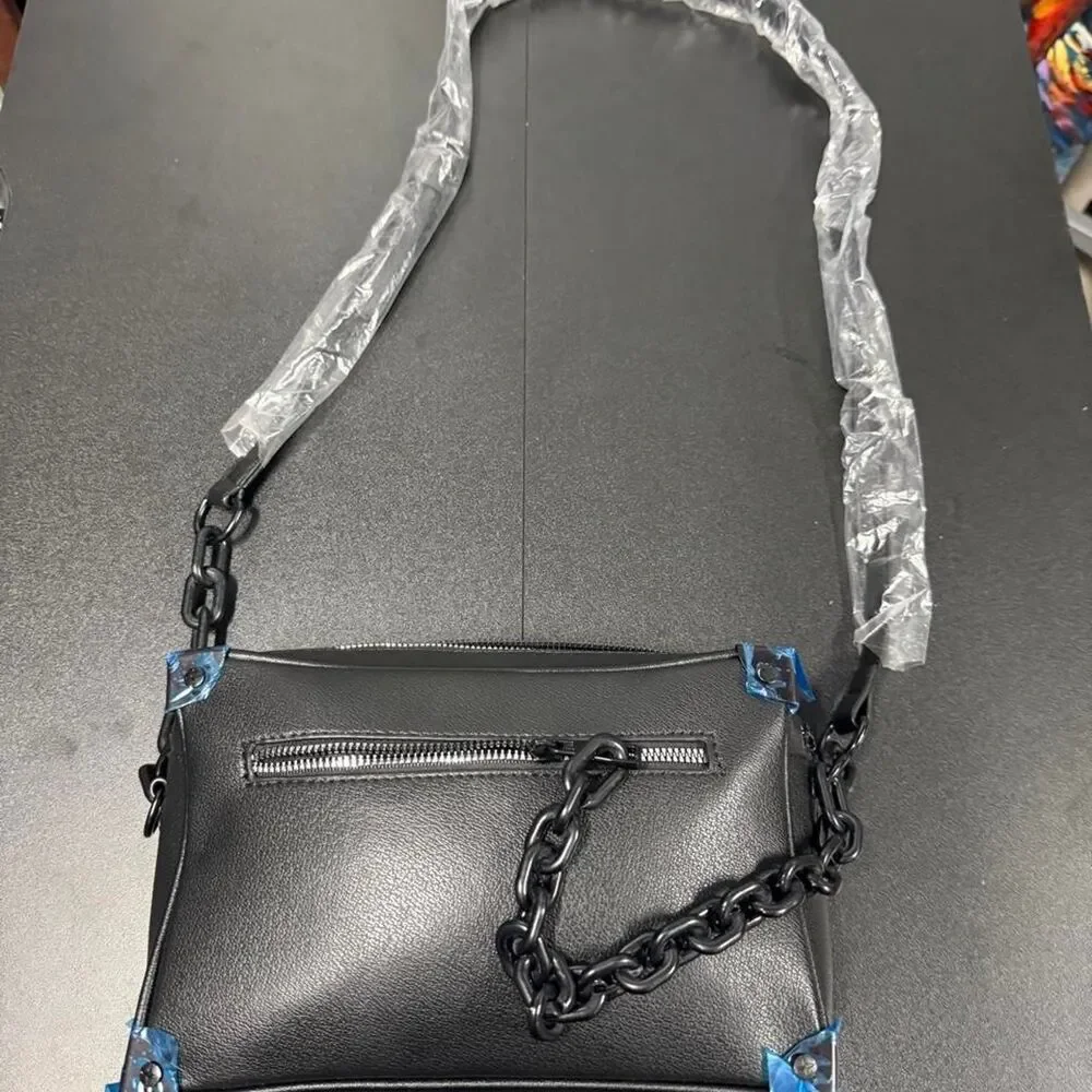 Black leather crossbody bag with chain strap
